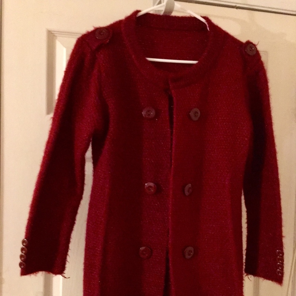 Red sweater cardigan.